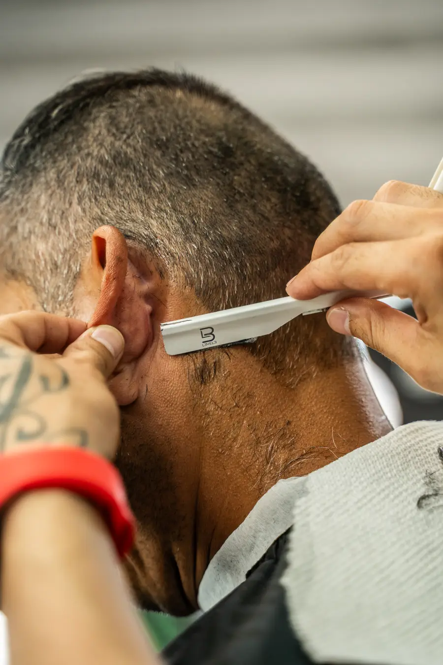 Razor detail behind the ear, closer